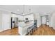 Well-equipped kitchen with granite countertops, stainless steel appliances, and breakfast bar seating at 3708 Wayfarer Way, Palmetto, FL 34221