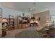 Cozy living area with built-in shelving, beachy décor, and comfortable seating at 379 Fairway Isles Ln, Bradenton, FL 34212