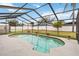 Inviting screened-in pool area perfect for relaxation and outdoor entertainment at 4062 Palau Dr, Sarasota, FL 34241