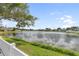 Relaxing view of the community pond from the backyard at 4080 Kingsfield Dr, Parrish, FL 34219