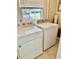 Laundry Room including a washing machine and dryer at 4511 Ardale St, Sarasota, FL 34232