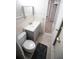 Bathroom with tiled walls, mirror, and a gray vanity at 5009 21St W St, Bradenton, FL 34207