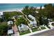 An aerial view shows the Wicker Inn Resort near the pristine beachfront at 5581 Gulf Of Mexico Dr, Longboat Key, FL 34228