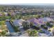 An aerial view of a beautiful community featuring lush landscaping and serene water features at 5618 Modena Pl, Sarasota, FL 34238