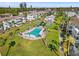 Overhead shot of community showcasing pool, tennis courts, and well-kept grounds at 5907 Garden Ln # H26, Bradenton, FL 34207