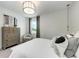 Bright bedroom with contemporary decor and a large window allowing natural light at 6013 White Mangrove Ln, Bradenton, FL 34210