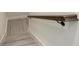 Staircase with hardwood handrail at 6013 White Mangrove Ln, Bradenton, FL 34210