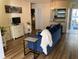 Cozy condo living room with breakfast bar overlooking updated kitchen at 6032 Arlene Way, Bradenton, FL 34207