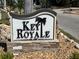 Entrance sign reading 'Key Royale Est. 1957' set among rocks and plants at 604 Dundee Ln, Holmes Beach, FL 34217