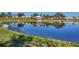 Scenic view of the neighborhood pond and the landscaped surrounding at 6418 13Th Avenue W Dr # 6418, Bradenton, FL 34209