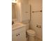 Well-lit bathroom featuring a vanity with storage and a toilet at 6924 Stones Throw N Cir # 8105, St Petersburg, FL 33710