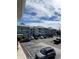 View of the condo building featuring ample parking and balconies at 6924 Stones Throw N Cir # 8105, St Petersburg, FL 33710