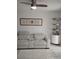 Cozy living room with a plush couch and decorative accents at 6924 Stones Throw N Cir # 8105, St Petersburg, FL 33710