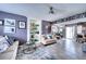 Inviting living room with a built-in display case and lots of natural light at 7067 Jarvis Rd, Sarasota, FL 34241