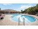 Beautiful community pool area with plenty of seating at 7326 Skybird Rd, Bradenton, FL 34209