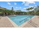 Lovely community pool area with plenty of room for swimming and lounging near the clubhouse at 7416 Botanica Pkwy # 103, Sarasota, FL 34238