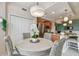 Kitchen dining nook with large closet nearby stainless appliances and a kitchen island with granite countertops at 803 Fairwaycove Ln # 106, Bradenton, FL 34212