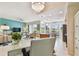 Bright and open living space with kitchen, dining, and sitting areas at 803 Fairwaycove Ln # 106, Bradenton, FL 34212
