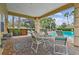 Community pool featuring an outdoor seating area and plenty of lounging space to relax and enjoy the Florida weather at 803 Fairwaycove Ln # 106, Bradenton, FL 34212