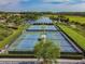 Enjoy tennis on one of the many tennis courts in the community with views of a well-maintained pond at 803 Fairwaycove Ln # 106, Bradenton, FL 34212