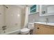 Bathroom with updated shower and vanity at 101 Base E Ave # 101 103, Venice, FL 34285