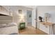 This bunk room with two twin beds boasts tile floors, closet and access to hallway and bathroom at 101 Base E Ave # 101 103, Venice, FL 34285