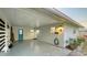 This spacious carport provides sheltered parking and easy access to the building's entrance at 101 Base E Ave # 101 103, Venice, FL 34285
