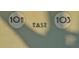 A close-up of unit numbers 101 and 103, highlighting the building's clean architectural details at 101 Base E Ave # 101 103, Venice, FL 34285