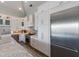 Well-equipped kitchen featuring stainless steel appliances, granite countertops and ample storage at 108 Magnolia Ave, Anna Maria, FL 34216