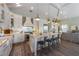 Well-appointed kitchen features a large island, stainless steel appliances, and modern finishes at 108 Magnolia Ave, Anna Maria, FL 34216