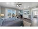 Comfortable main bedroom offers views of the town and a flat screen tv at 108 Magnolia Ave, Anna Maria, FL 34216