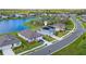 Aerial view of two-story home with solar panels located on a well-maintained lot at 11531 Moonsail Dr, Parrish, FL 34219