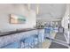 The bar is stone faced and provides seating and a TV for patrons of the community at 11531 Moonsail Dr, Parrish, FL 34219
