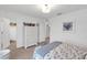 Neutral bedroom features carpet, toys, and access to a closet and an ensuite bathroom at 11531 Moonsail Dr, Parrish, FL 34219