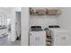Bright laundry room with modern washer and dryer at 11531 Moonsail Dr, Parrish, FL 34219