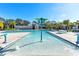 Gathering friendly pool with shallow areas and a water feature for  at 11531 Moonsail Dr, Parrish, FL 34219
