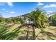 Green lawn and landscaping in the backyard area at 11981 Hunters Creek Rd, Venice, FL 34293