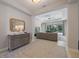 Welcoming foyer leading to a spacious living area with a view of the backyard at 11981 Hunters Creek Rd, Venice, FL 34293