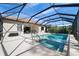 Beautiful pool enclosed in screen offering clear blue water at 11981 Hunters Creek Rd, Venice, FL 34293