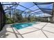 Sparkling screened-in pool offers a relaxing escape with serene views at 11981 Hunters Creek Rd, Venice, FL 34293