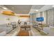 Modern lounge area with comfortable seating, decorative lighting, and a sophisticated design at 1211 Gulf Of Mexico Dr # 207, Longboat Key, FL 34228
