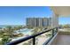 View from the balcony overlooking the beautiful pool, manicured gardens and sparkling ocean at 1211 Gulf Of Mexico Dr # 207, Longboat Key, FL 34228