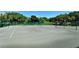 An outside tennis court area provides recreational opportunities at 1211 Gulf Of Mexico Dr # 207, Longboat Key, FL 34228