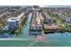 Aerial view showcasing the community's waterfront residences and lush landscaping along the waterway at 1250 N Portofino Dr # 408Mar, Sarasota, FL 34242