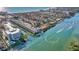 Stunning aerial view of the community featuring waterfront properties and beautiful coastal scenery at 1250 N Portofino Dr # 408Mar, Sarasota, FL 34242