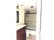 Bathroom with a vanity, mirror, toilet, and a tiled shower/tub combo at 1250 N Portofino Dr # 408Mar, Sarasota, FL 34242