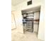 Organized walk-in closet featuring adjustable shelving and drawer storage at 1250 N Portofino Dr # 408Mar, Sarasota, FL 34242