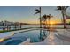 This house has a private backyard pool and hot tub with waterfront views at 1400 Siesta Dr, Sarasota, FL 34239