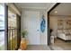 Balcony door shows interior to a living space with comfortable seating at 14459 River Beach Dr # 218, Port Charlotte, FL 33953