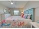 Inviting bedroom with beach-themed decor, bright window, and comfortable furnishings for a relaxing retreat at 14459 River Beach Dr # 218, Port Charlotte, FL 33953